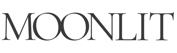 The word 'MOONLIT' in a stylized font on a white background