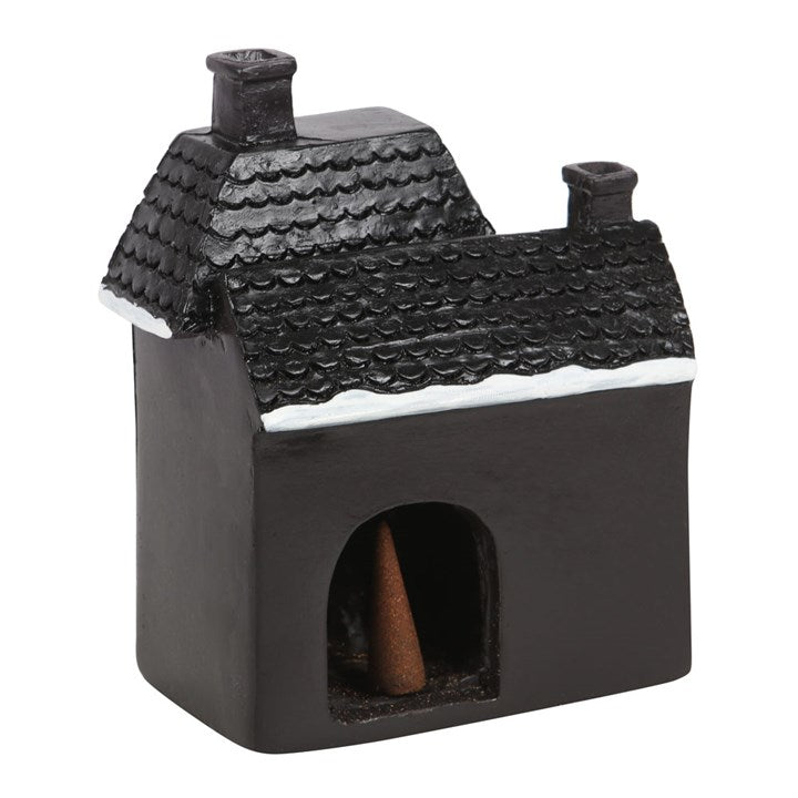 Black ceramic fireplace with a chimney on a white background