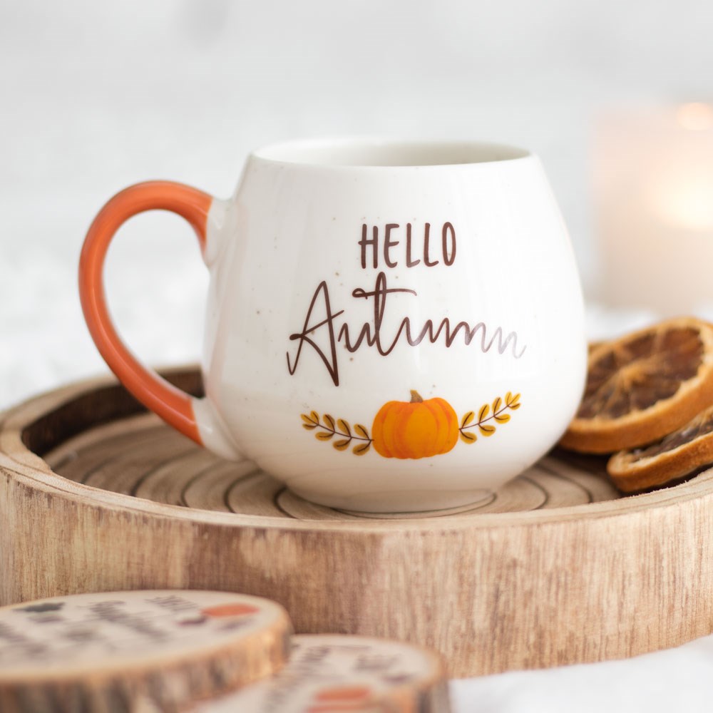 Hello Autumn Ceramic Mug - White mug with 'Hello Autumn' text and pumpkin with leaves design.