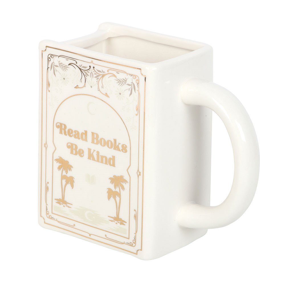 White coffee mug or tea cup with 'Read Books, Be Kind' text and palm golden trees. It can be used as bookish decor as well. Side view.