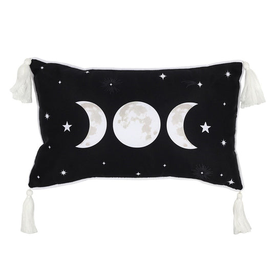 Black pillow with moon phases and stars on a white background