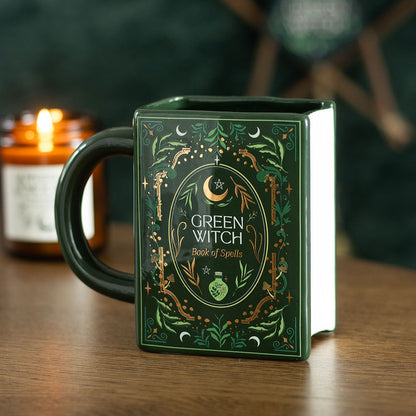 Coffee or tea mug with 'Green Witch - Book of Spells' text and leaves, moons. 