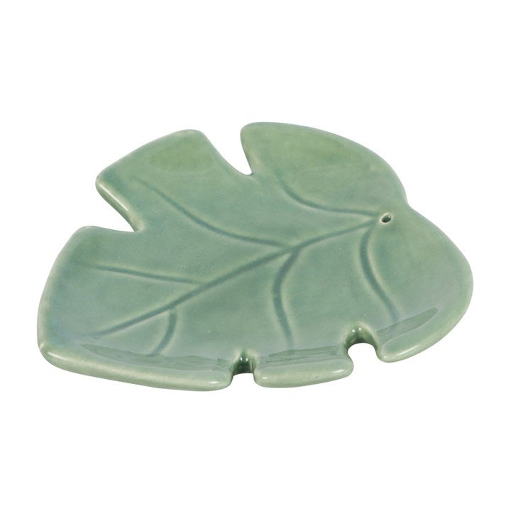 Green ceramic cute leaf-shaped incense stick holder. Can be used as a trinket dish or candle holder as well.