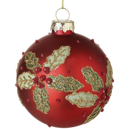 Hanging decorative red ball ornament for trees with gold and green leaf, holy flower.