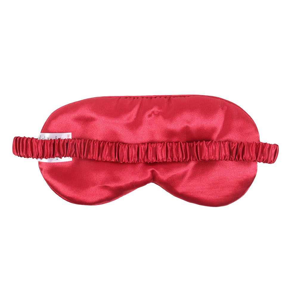 Red sleep mask with 'Sweet Dreams' text, hearts, moons and stars.